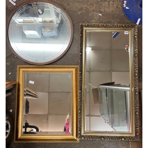 542 - TWO GILT FRAMED MIRRORS AND A CIRCULAR WOODEN FRAMED MIRROR