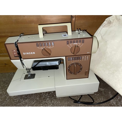 19 - ELECTRIC SEWING MACHINE WITH COVER