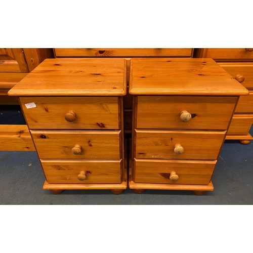 9 - DARKER PINE PAIR OF THREE DRAWER BEDSIDE CHESTS