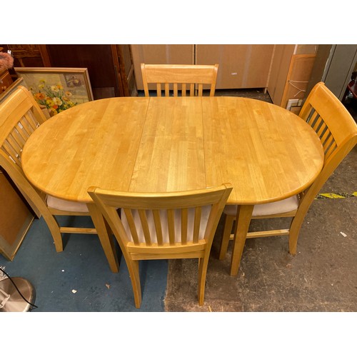 42 - BEECH OVAL DINING TABLE AND FOUR CHAIRS