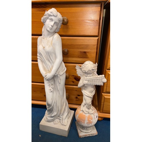 23 - RESIN STONE EFFECT GARDEN STATUE OF A CHERUB WITH PANPIPES AND A MAIDEN