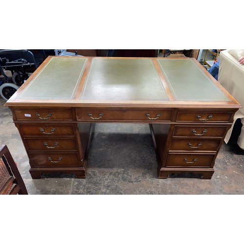 138 - GOOD QUALITY GEORGIAN STYLE KNEEHOLE PARTNERS DESK WITH INSET THREE SECTION GILT TOOLED GREEN LEATHE... 