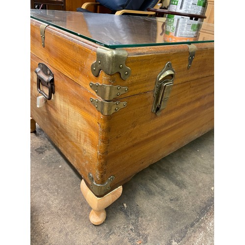 152 - HARDWOOD BRASS MOUNTED TRUNK CONVERTED TO A COFFEE TABLE