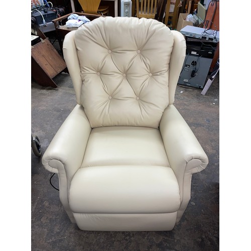 145 - CELEBRITY CREAM LEATHER ELECTRIC RECLINER RISER ARMCHAIR