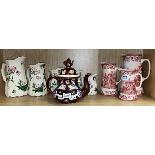 524 - SHELF OF STUDIO POTTERY ITEMS, STONEWARE JAR, AND SOME SOAPSTONE