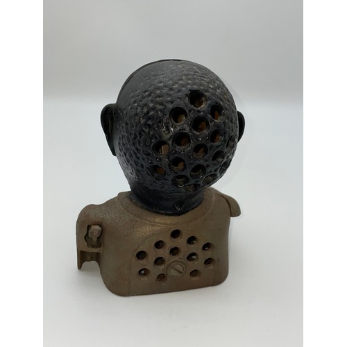 557 - CAST IRON NEGRO MONEY BANK