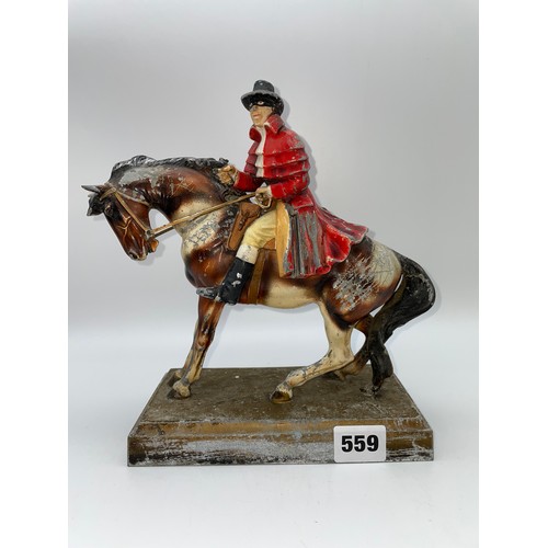 559 - CAST COLD PAINTED SPELTER FIGURE GROUP OF THE HIGHWAY MAN