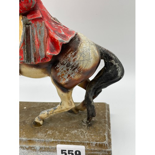 559 - CAST COLD PAINTED SPELTER FIGURE GROUP OF THE HIGHWAY MAN