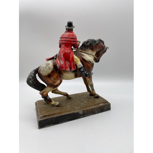 559 - CAST COLD PAINTED SPELTER FIGURE GROUP OF THE HIGHWAY MAN