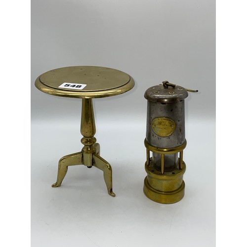 548 - MANX LEGGED BRASS TRIPOD TRIVET AND MINIATURE MINERS SAFETY LAMP