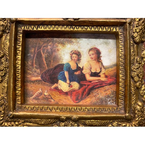 435 - GILT CARTOUCHE FRAMED MIRROR, PAIR OF GILDED CHERUB FRAMES, PAINTED PANEL IN FRAME AND A NEEDLEWORK ... 