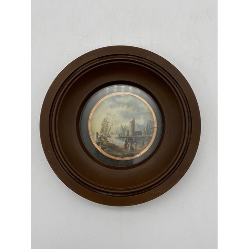 579 - 19TH CENTURY DUTCH SCHOOL OIL ON CANVAS MINIATURE OF FISHER FOLK BY RIVER IN A HARDWOOD ROUNDEL