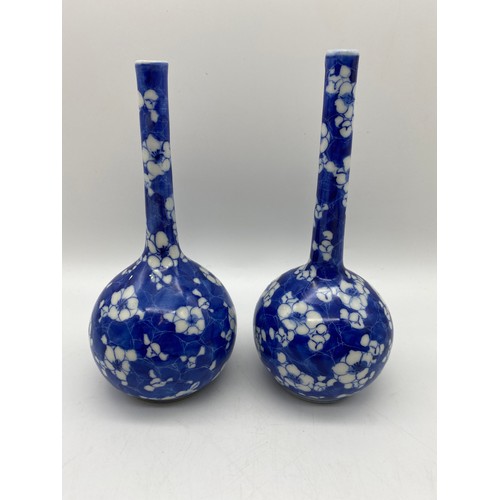 690 - PAIR OF CHINESE BLUE AND WHITE PRUNUS BLOSSOM DECORATED VASES