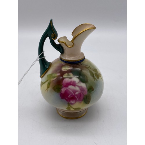 692 - ROYAL WORCESTER SQUAT BULBOUS EWER PAINTED WITH ROSES