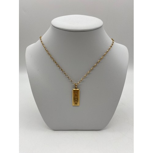 673 - 9CT GOLD INGOT PENDANT ON A BELCHER LINK CHAIN 8G APPROX