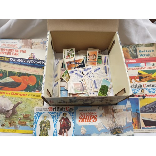 646 - SMALL BOX OF BROOKE BOND TEACARD ALBUMS AND SOME LOOSE CARDS AND SWAPS