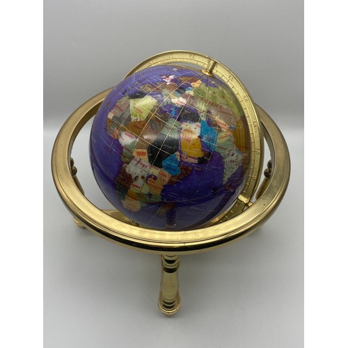 533 - POLISHED STONE TERRESTRIAL GLOBE IN A BRASS LACQUERED STAND