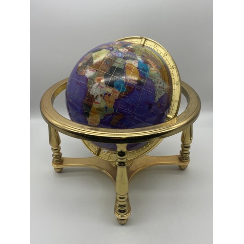 533 - POLISHED STONE TERRESTRIAL GLOBE IN A BRASS LACQUERED STAND