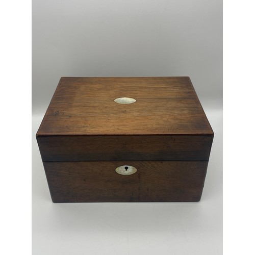 704 - 19TH CENTURY MAHOGANY TRAVELLING VANITY BOX WITH BOTTLES AND COMPARTMENTS