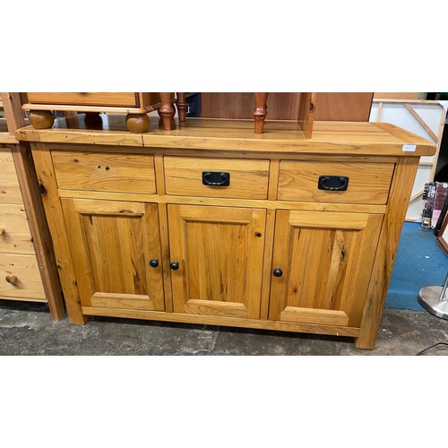 55 - CONTEMPORARY OAK THREE DRAWER SIDEBOARD