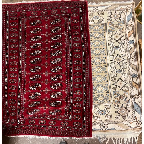 216A - Red pattern rug and one other 135cm x85 142cm x94