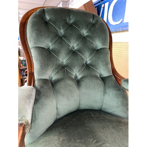 215 - VICTORIAN GREEN BUTTON BACK UPHOLSTERED ARMCHAIR