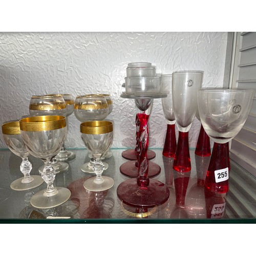 255 - RED STEMMED GLASSES AND GILT EDGED GOBLETS