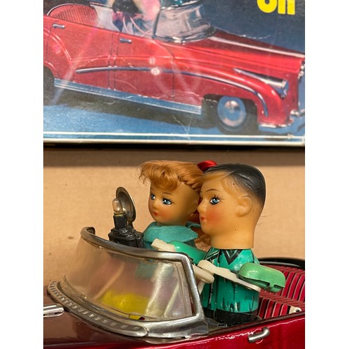 267 - JAPANESE BATTERY-OPERATED ENAMEL PHOTOING ON CAR TOY