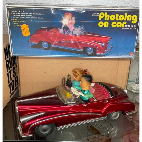 267 - JAPANESE BATTERY-OPERATED ENAMEL PHOTOING ON CAR TOY