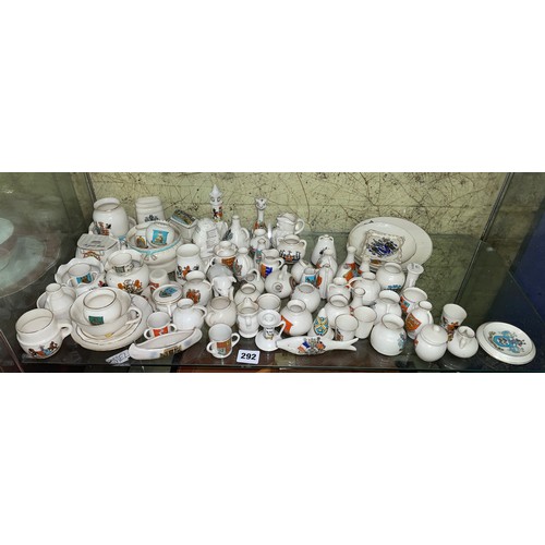 292 - SHELF OF CRESTED WARE - VASES, CLOCK TOWER, PLATES, ANIMALS, ETC