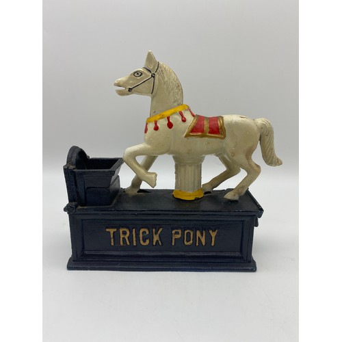 422 - REPRODUCTION CAST IRON TRICK PONY MONEY BANK