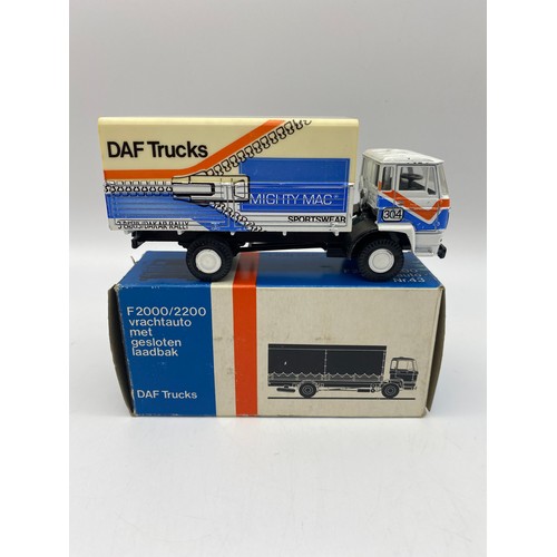 437 - TWO BOXED LION CAR RALEIGH PARIS - DAKAR 1983, AND A TRUCK AND TRAILER