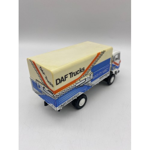 437 - TWO BOXED LION CAR RALEIGH PARIS - DAKAR 1983, AND A TRUCK AND TRAILER