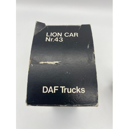 437 - TWO BOXED LION CAR RALEIGH PARIS - DAKAR 1983, AND A TRUCK AND TRAILER