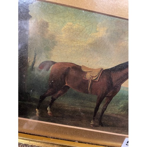 559 - REPRODUCTION OF A 19TH CENTURY OIL ON PANEL OF A RACE HORSE WITH ATTENDANT IN FINE GILT SWEPT FRAME ... 