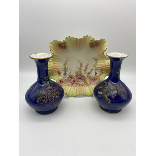 480 - PAIR OF CARLTONWARE BLUE FLORAL AND GILDED BULBOUS VASES AND A BLUSH FLORAL CRIMPED DISH