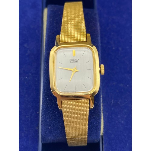 505 - TOMMY HILFIGER TWO TONE STAINLESS MESH WRIST WATCH AND A SEIKO LADIES WRIST WATCH