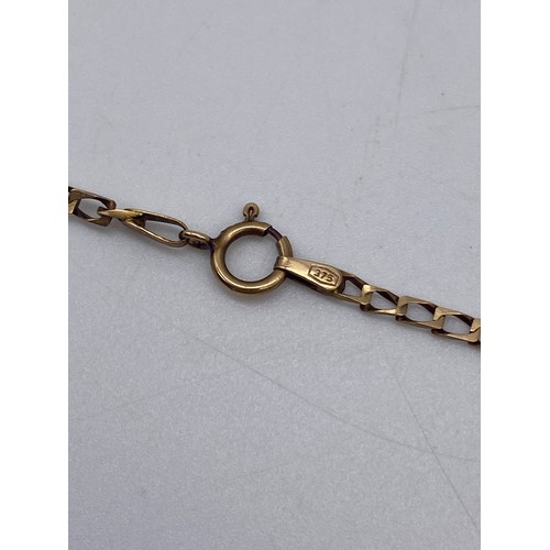 513 - 9CT GOLD AND DIAMOND CROSS ON A FLAT CURB LINK CHAIN 4.9G APPROX