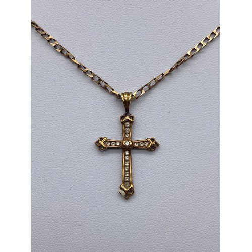 513 - 9CT GOLD AND DIAMOND CROSS ON A FLAT CURB LINK CHAIN 4.9G APPROX