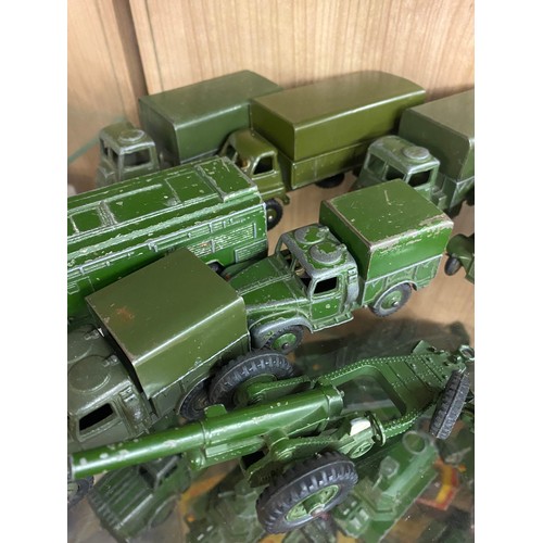 365 - TWO SHELVES OF MAINLY DINKY DIE CAST MILITARY VEHICLES, FIELD GUNS, AMBULANCE, ETC