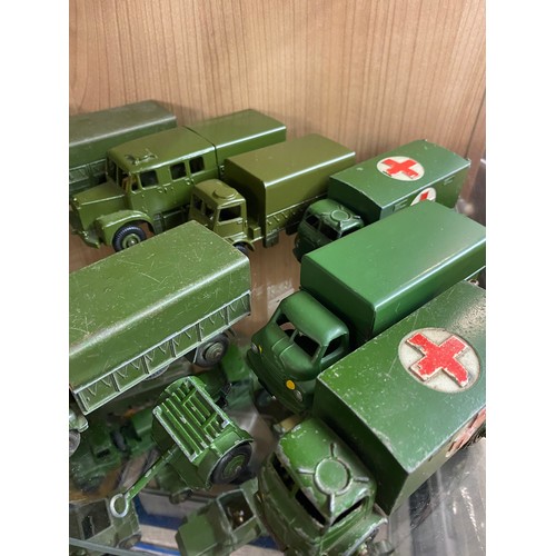 365 - TWO SHELVES OF MAINLY DINKY DIE CAST MILITARY VEHICLES, FIELD GUNS, AMBULANCE, ETC