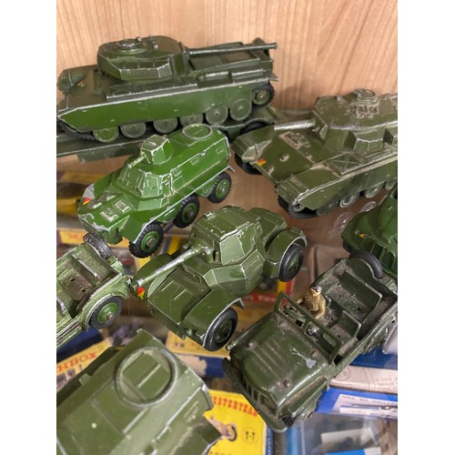 365 - TWO SHELVES OF MAINLY DINKY DIE CAST MILITARY VEHICLES, FIELD GUNS, AMBULANCE, ETC