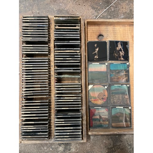 548 - WOODEN BOX OF GLASS PROJECTOR SLIDES HAND PAINTED AROUND THE WORLD