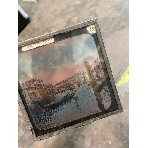 548 - WOODEN BOX OF GLASS PROJECTOR SLIDES HAND PAINTED AROUND THE WORLD