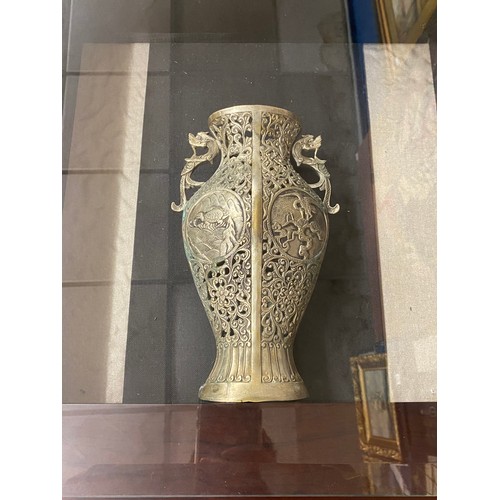 527 - CHINESE METAL WORK COMPRESSED BALUSTER VASE WITH DRAGON HANDLES IN A GLAZED CASE