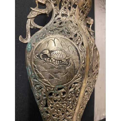 527 - CHINESE METAL WORK COMPRESSED BALUSTER VASE WITH DRAGON HANDLES IN A GLAZED CASE