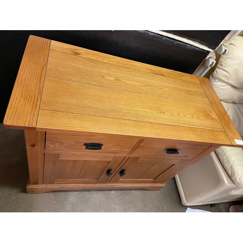 131 - OAK SIDE CUPBOARD WITH TWO DRAWERS