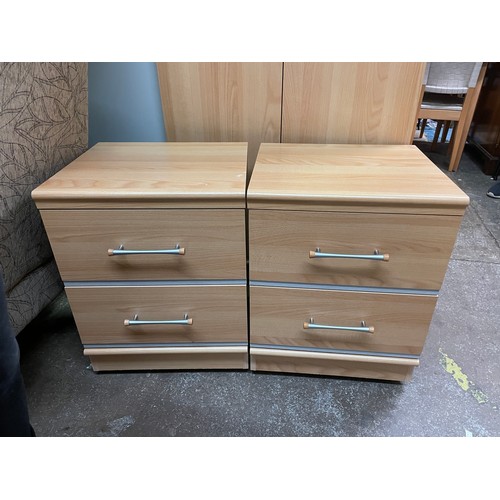 65 - TEAK EFFECT TWO DRAWER BEDSIDE CHESTS