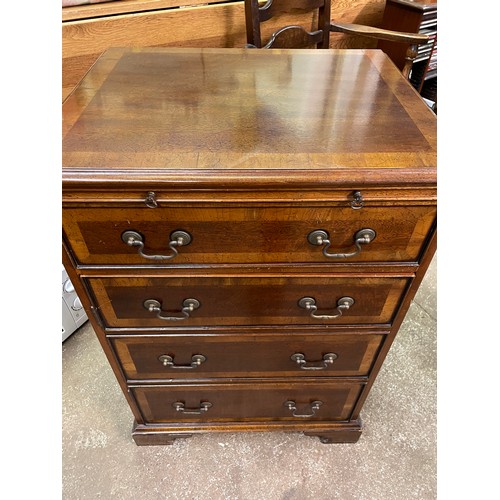 73 - REPRODUCTION MAHOGANY CROSS BANDED FAUX CHEST CABINET