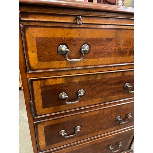 73 - REPRODUCTION MAHOGANY CROSS BANDED FAUX CHEST CABINET